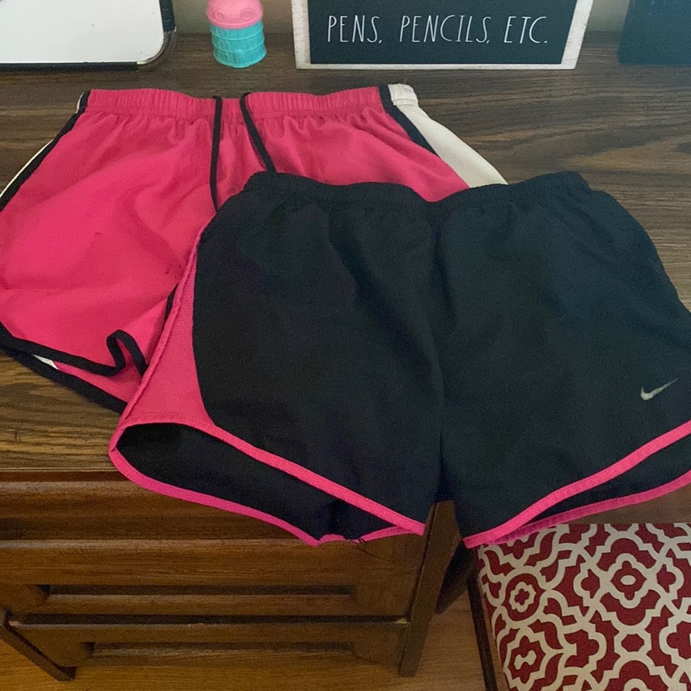 2 pack of pink and black Nike shorts